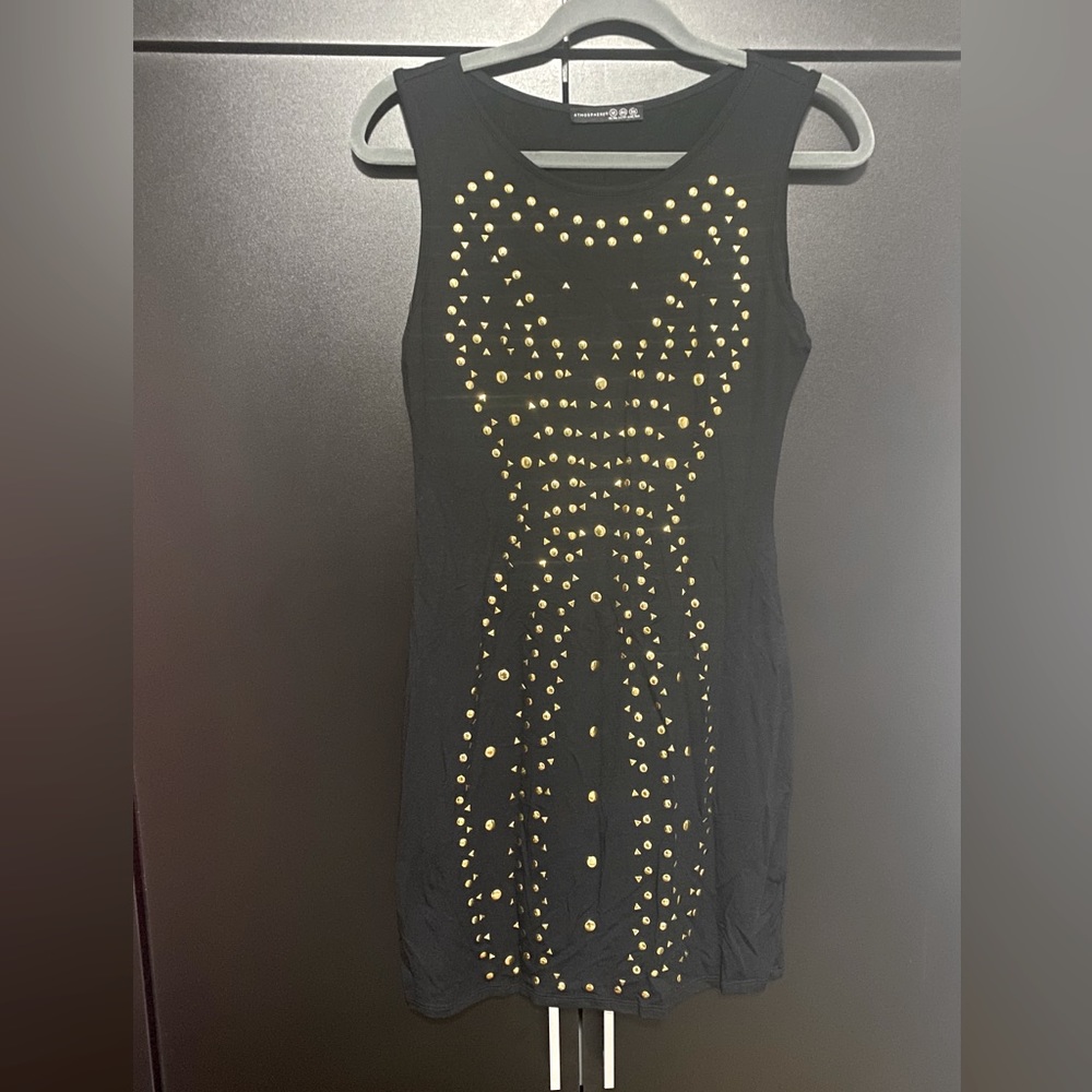 Atmosphere black dress with gold embellishments. Sleeveless